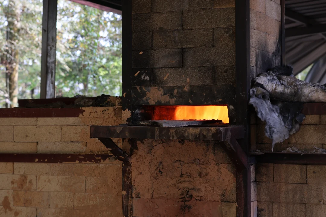 Ceramic kiln during firing with glowing kiln chamber