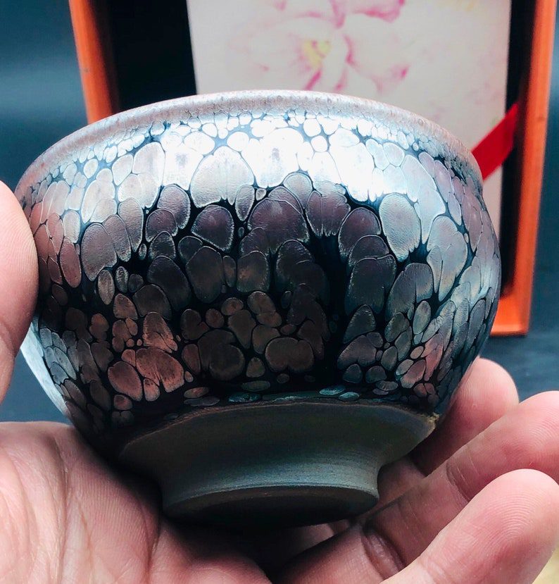 Jian ware bowl by Lü Mengfei showing metallic crystalline glaze