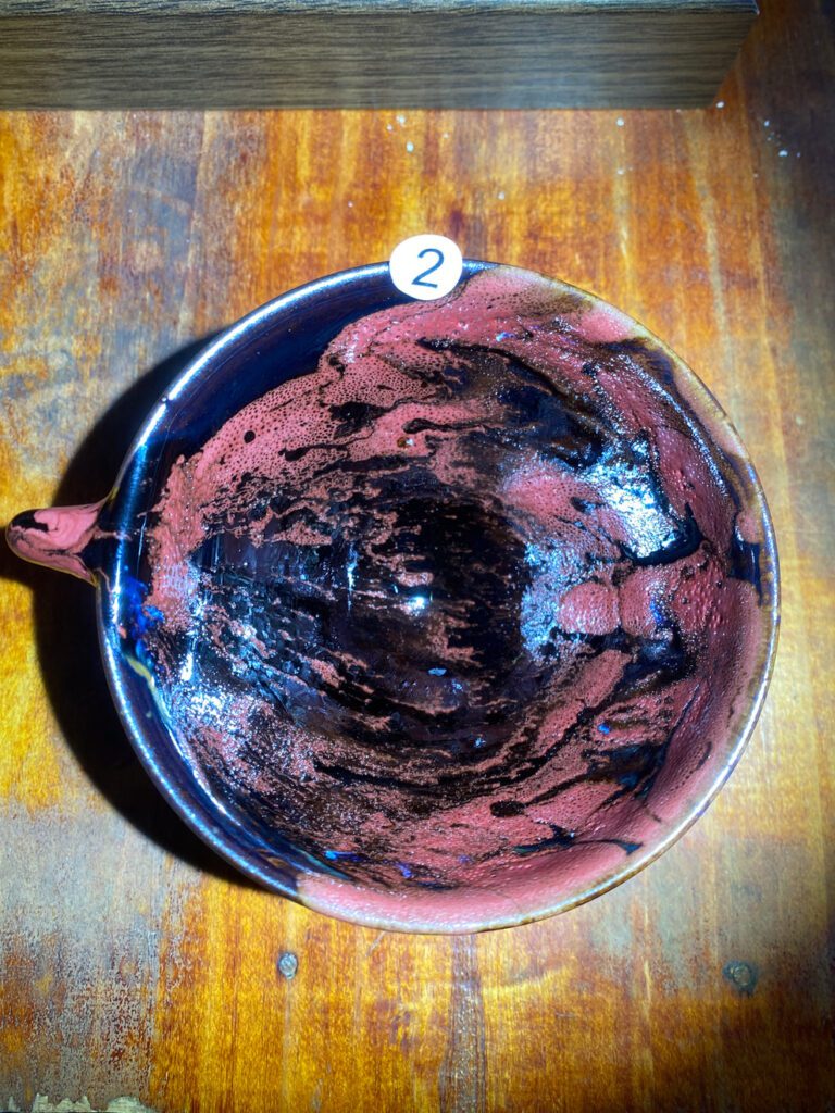 You Jiajun Jian ware with coral red and dark flowing glaze