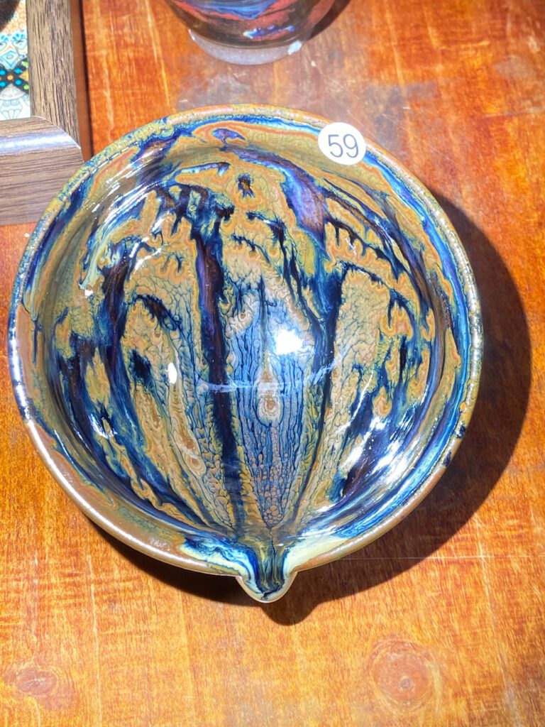 Side-fired Jian ware by You Jiajun showing blue, gold and flowing kiln effects