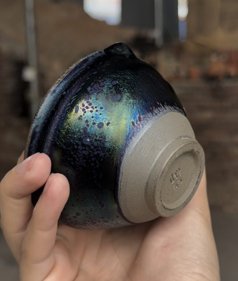 You Jiajun Jian ware side firing with iridescent blue green and purple surface
