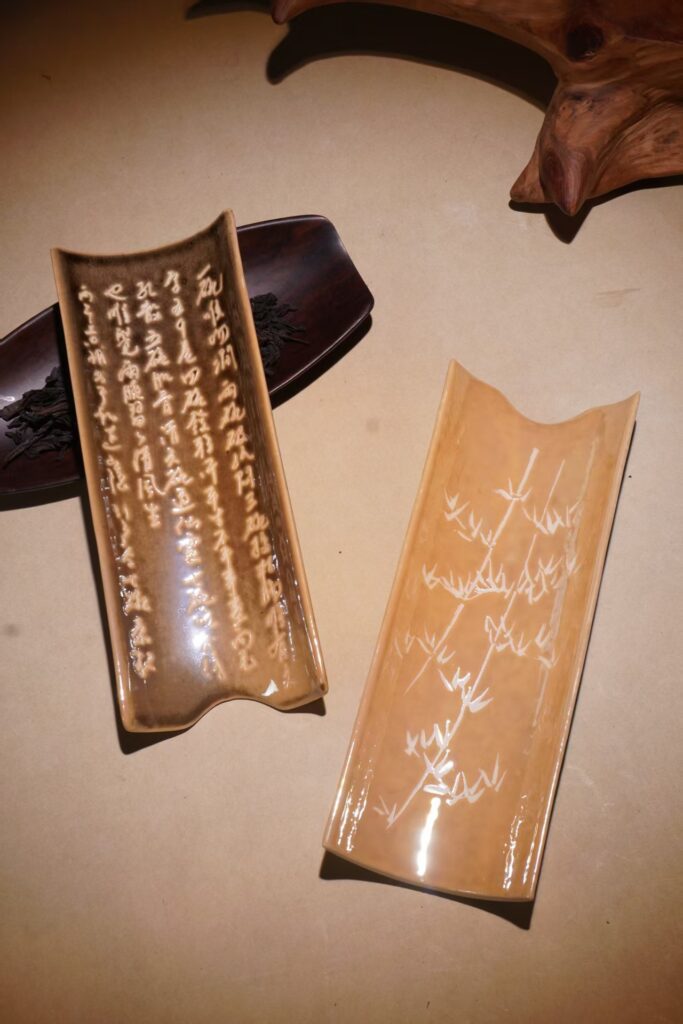 Calligraphy and bamboo decorated ceramic trays from Heyuan Shanyin