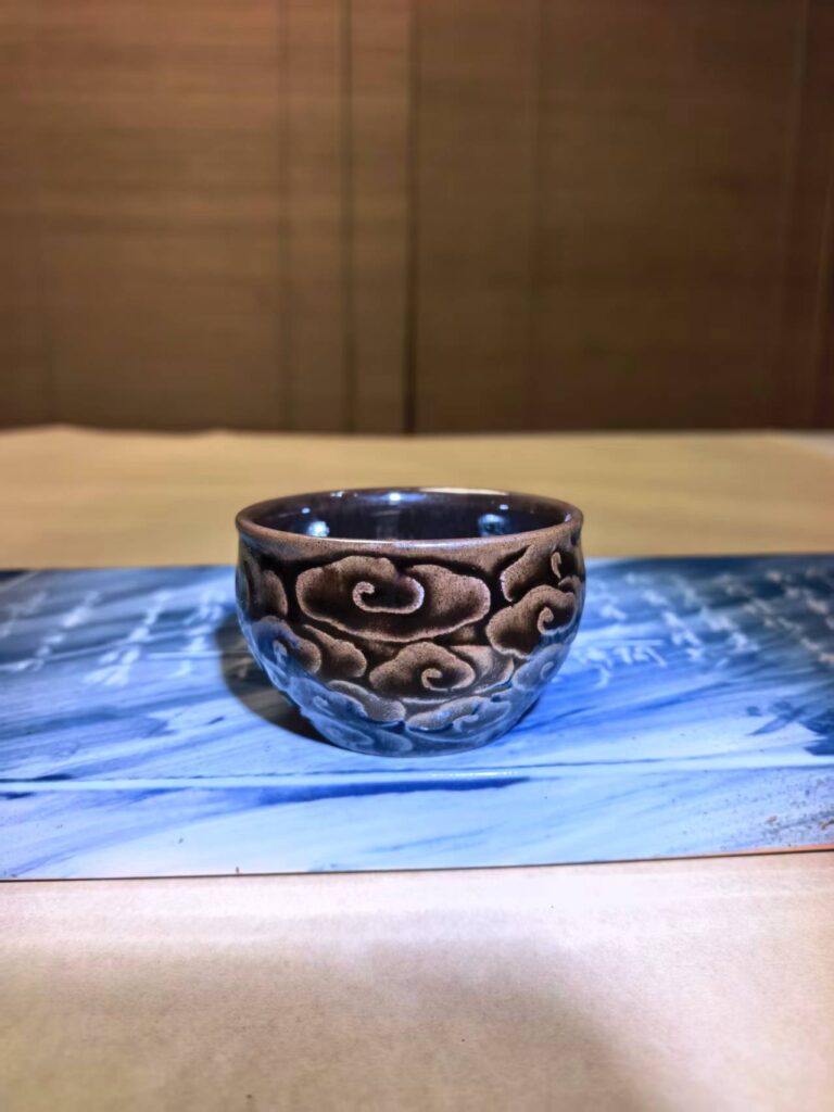 Cloud relief ceramic vessel from Heyuan Shanyin